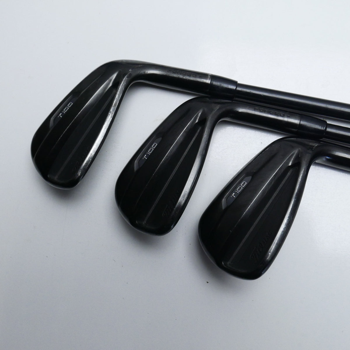 Used Titleist T100 2021 Black Iron Set / 4 - PW / Stiff Flex