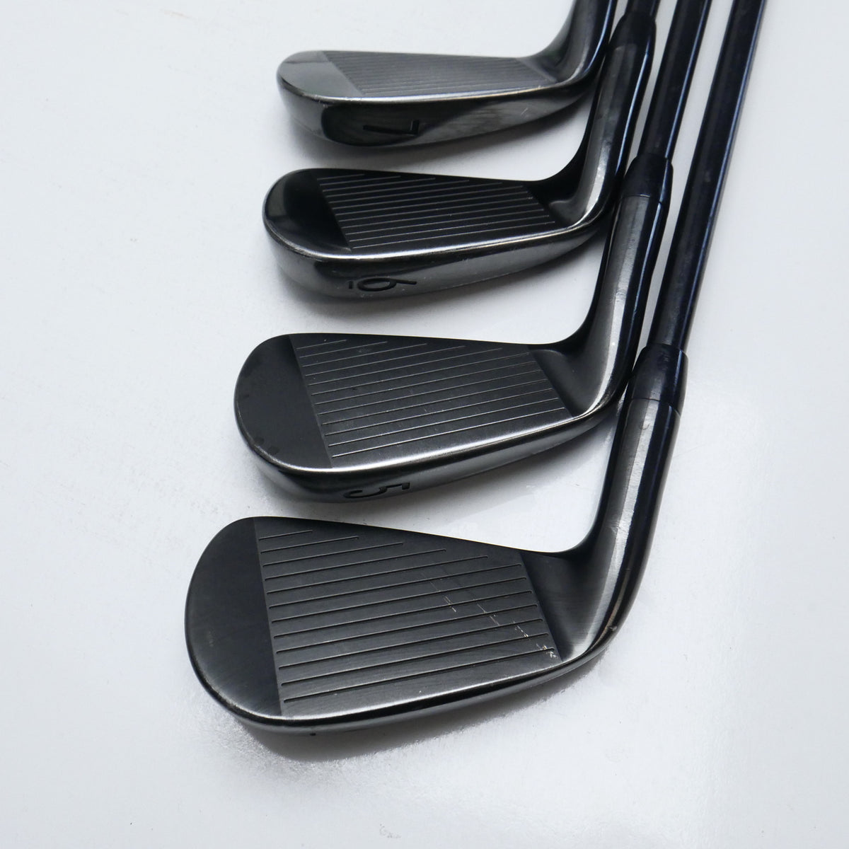 Used Titleist T100 2021 Black Iron Set / 4 - PW / Stiff Flex