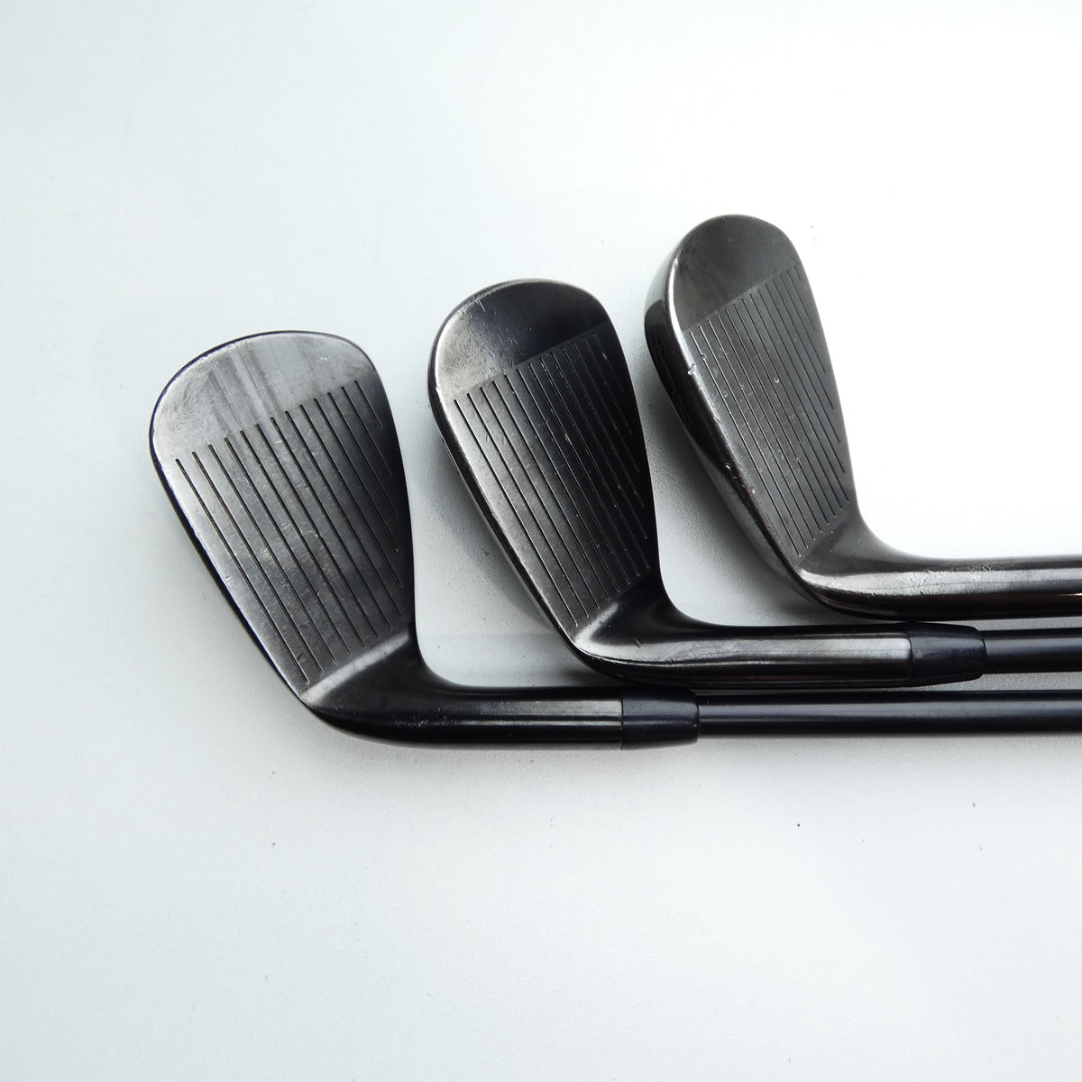 Used Titleist T150 2023 Vapor Black Iron Set / 4 - PW / Stiff Flex