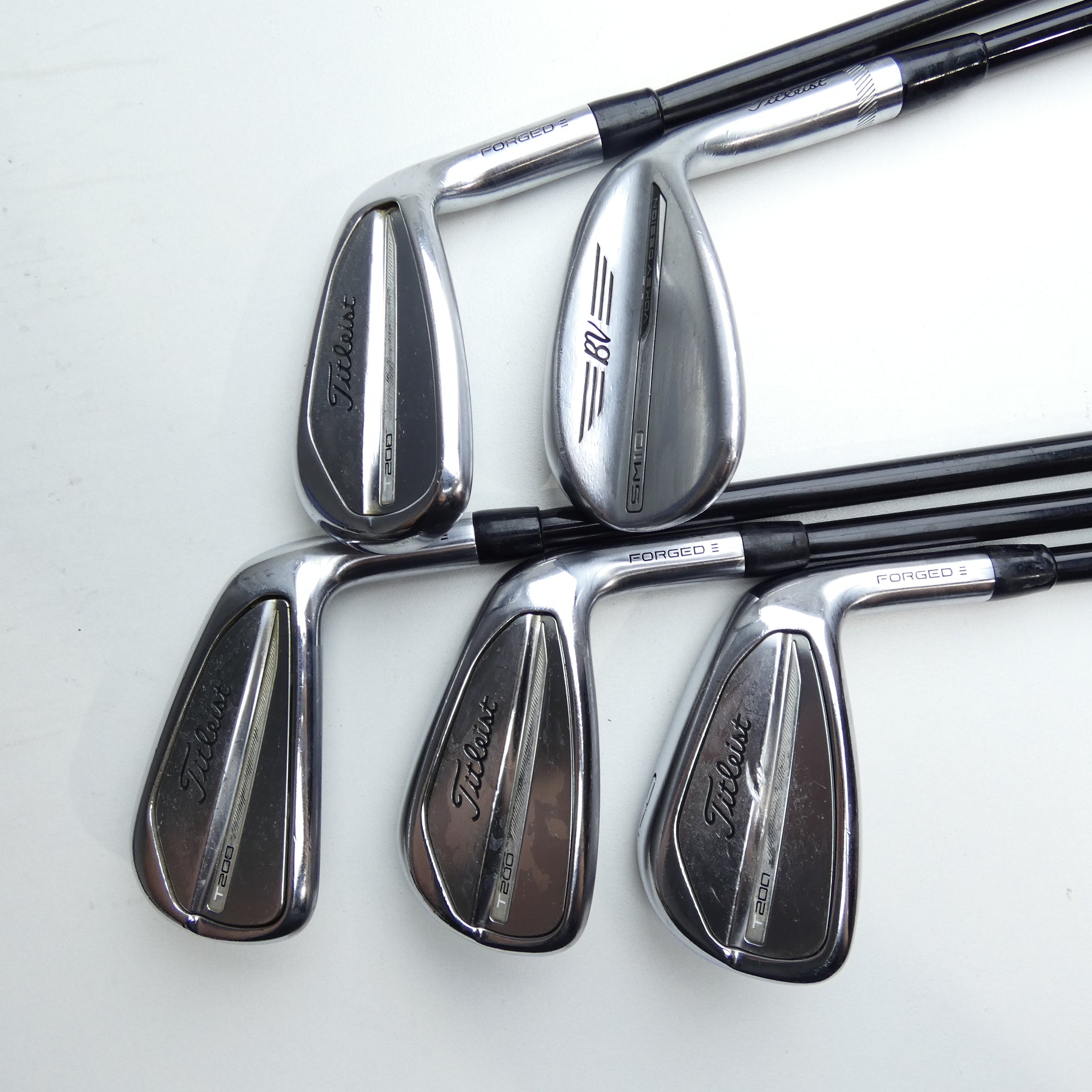 Used Titleist T200 2023 Iron Set / 7 - PW + SW / Regular Flex