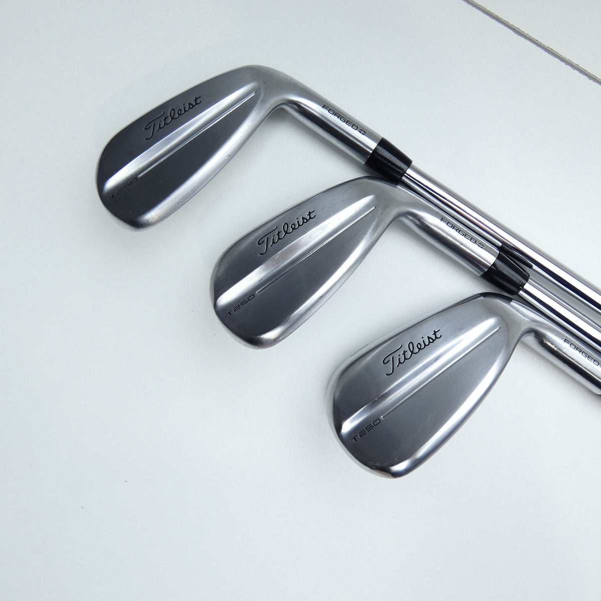 Used Titleist T250 2025 Iron Set / 5 - PW + 48° / Stiff Flex