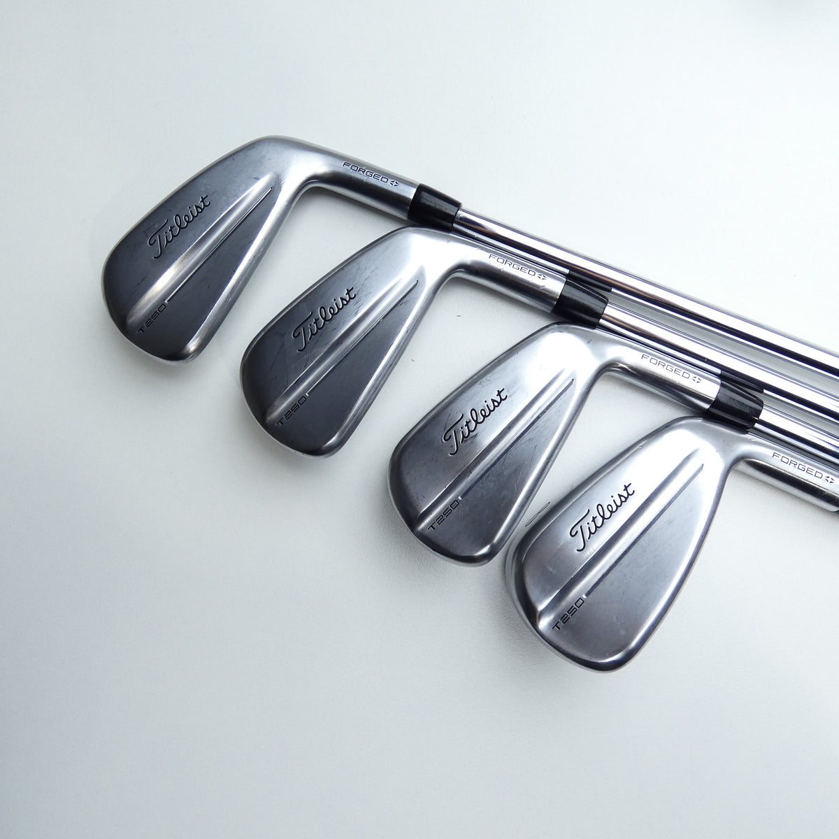 Used Titleist T250 2025 Iron Set / 5 - PW + 48° / Stiff Flex