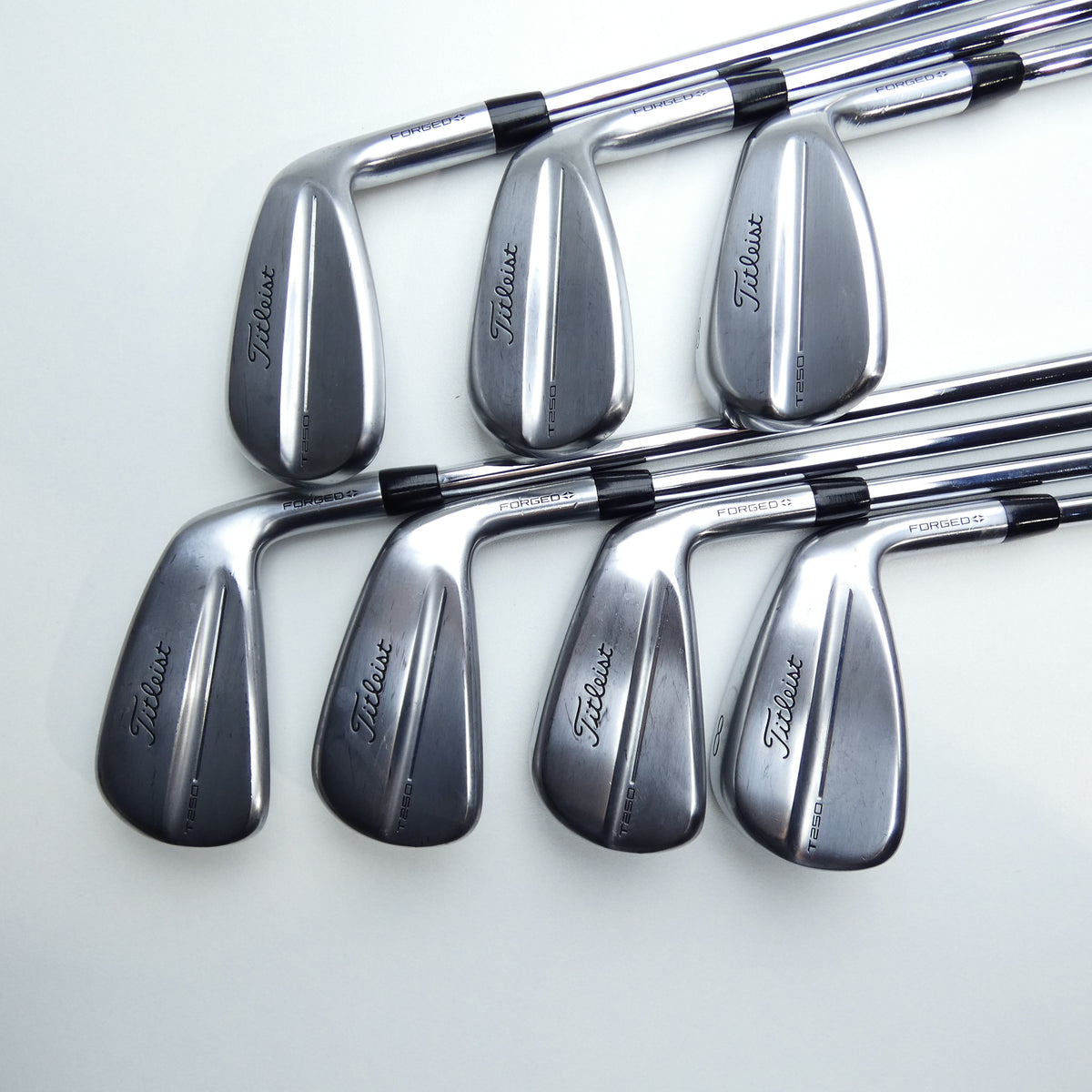Used Titleist T250 2025 Iron Set / 5 - PW + 48° / Stiff Flex