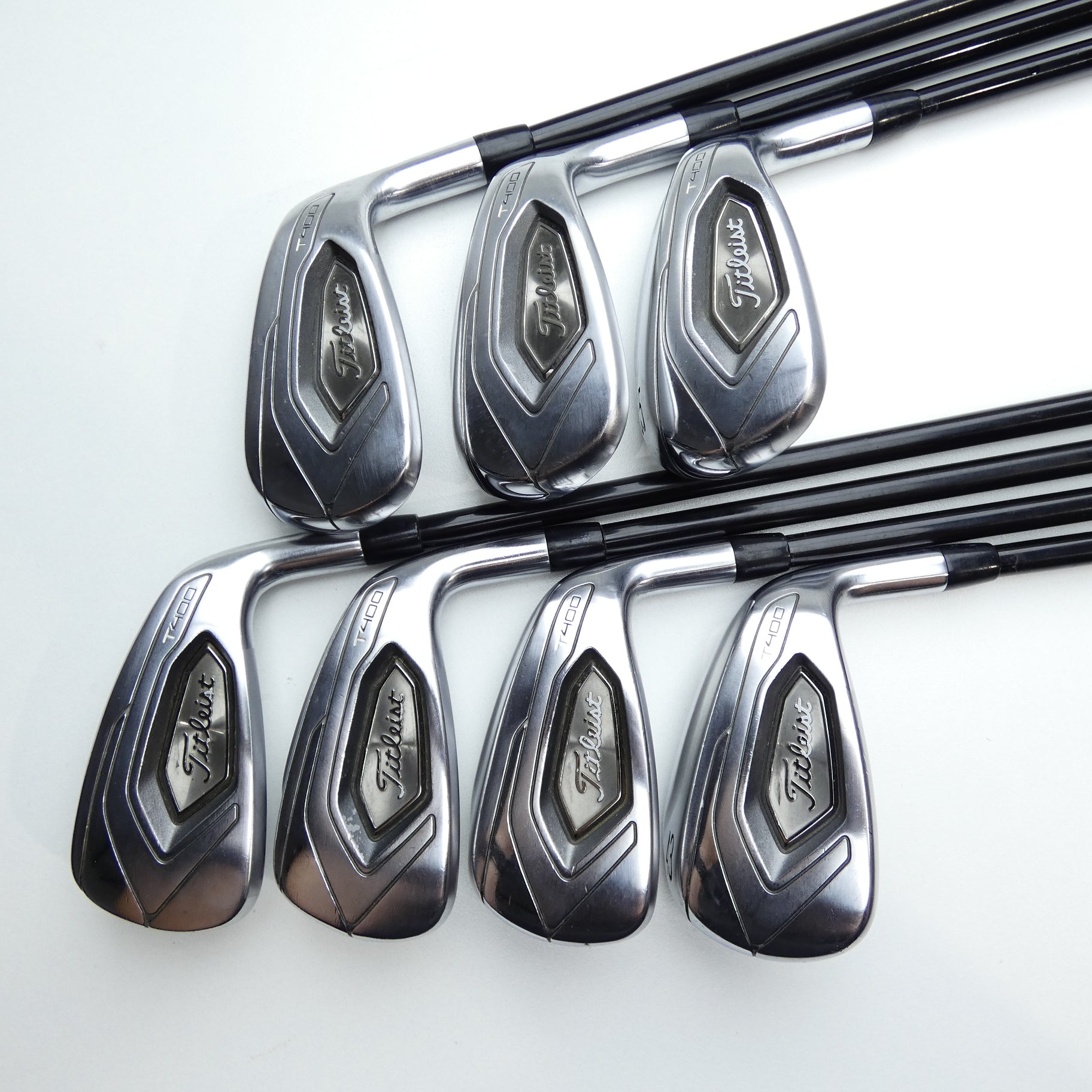 Used Titleist T400 Iron Set / 7 - SW + 43° + 49° / Regular Flex